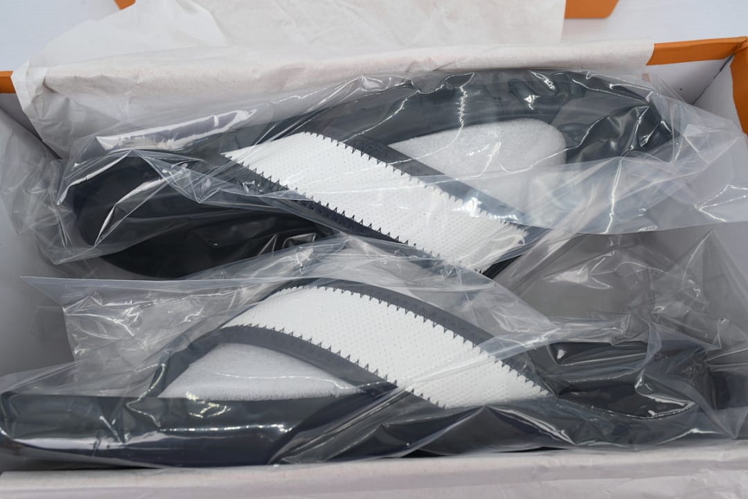Louis Vuitton LV Slipper Flip Flops Net Black And White